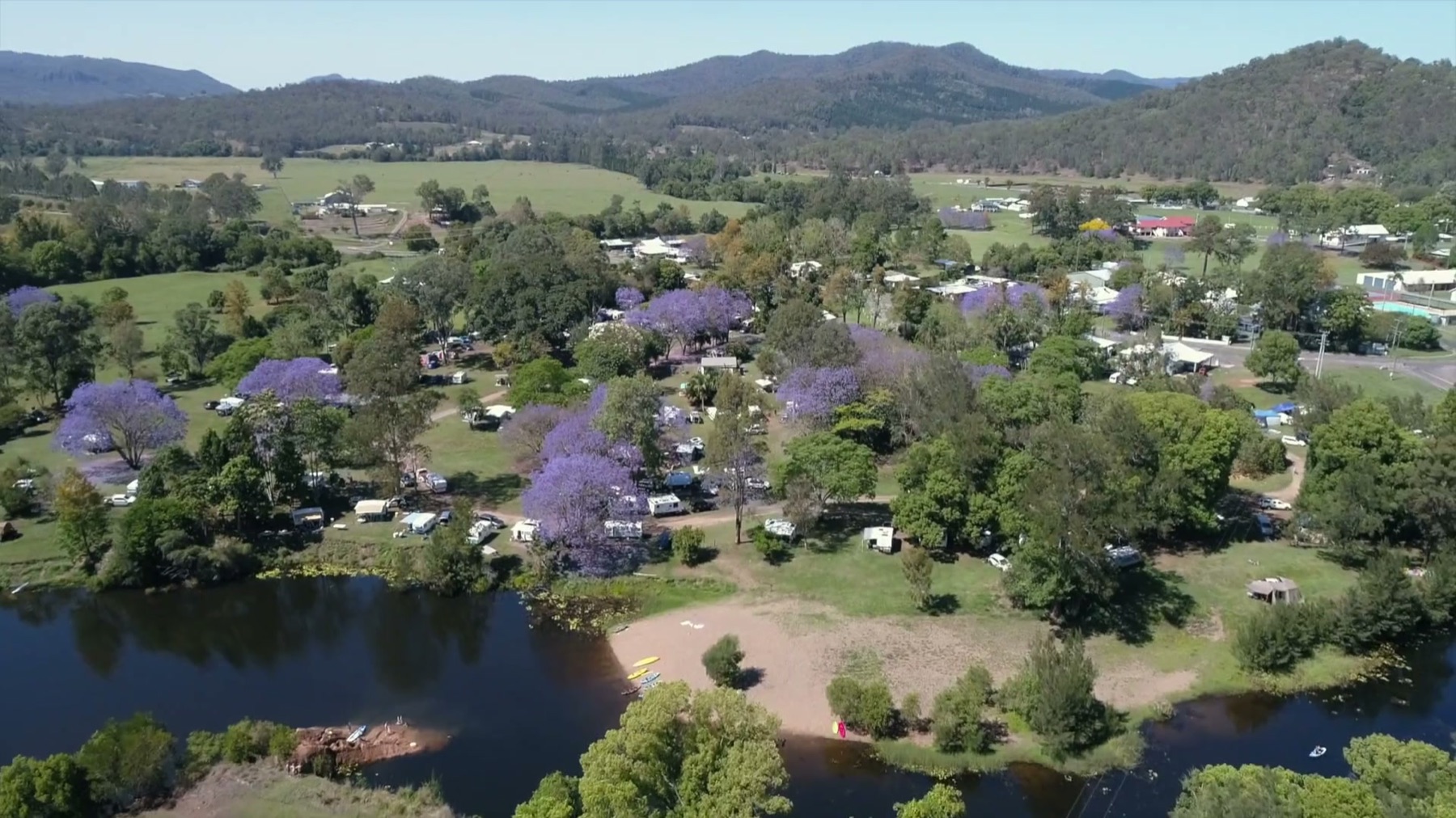 Aerial view of the creek, campsites and surrounding Mary Valley hills